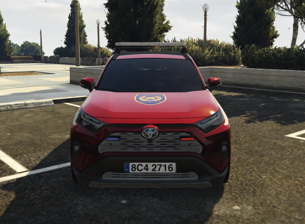 HZS Toyota RAV4 head-on, showing the bonnet emblem and roof lightbar