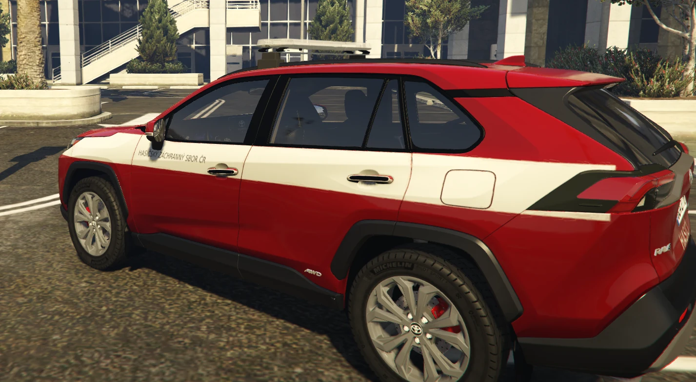 Side view of the HZS Toyota RAV4 showing the white livery stripe and rear quarter